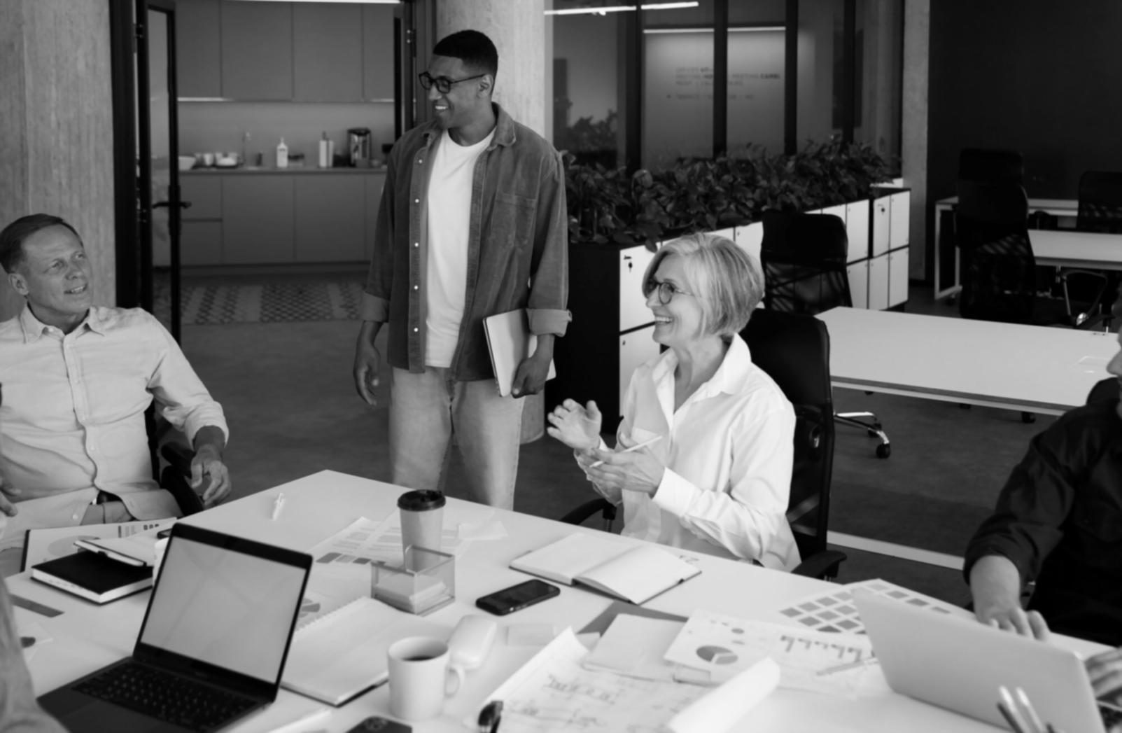 Small business owner reviewing financial documents at desk