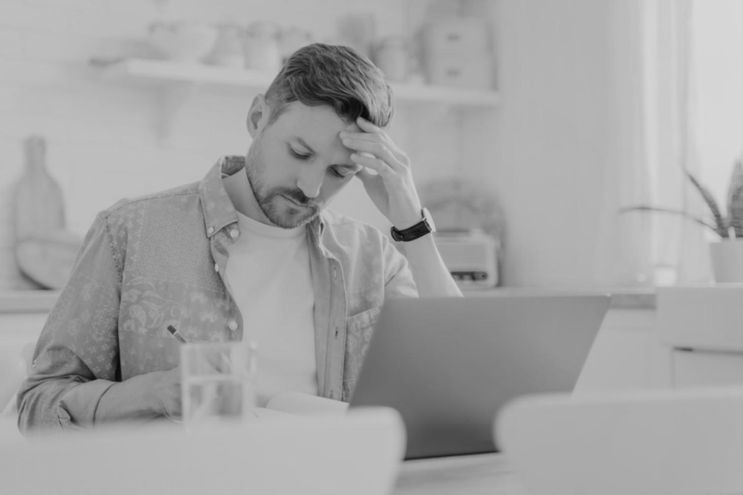 Business owner analyzing financial reports with charts